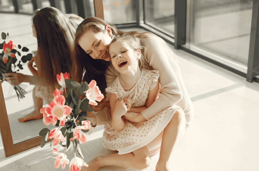 photo-of-mother-and-daughter-sitting-on-the-floor