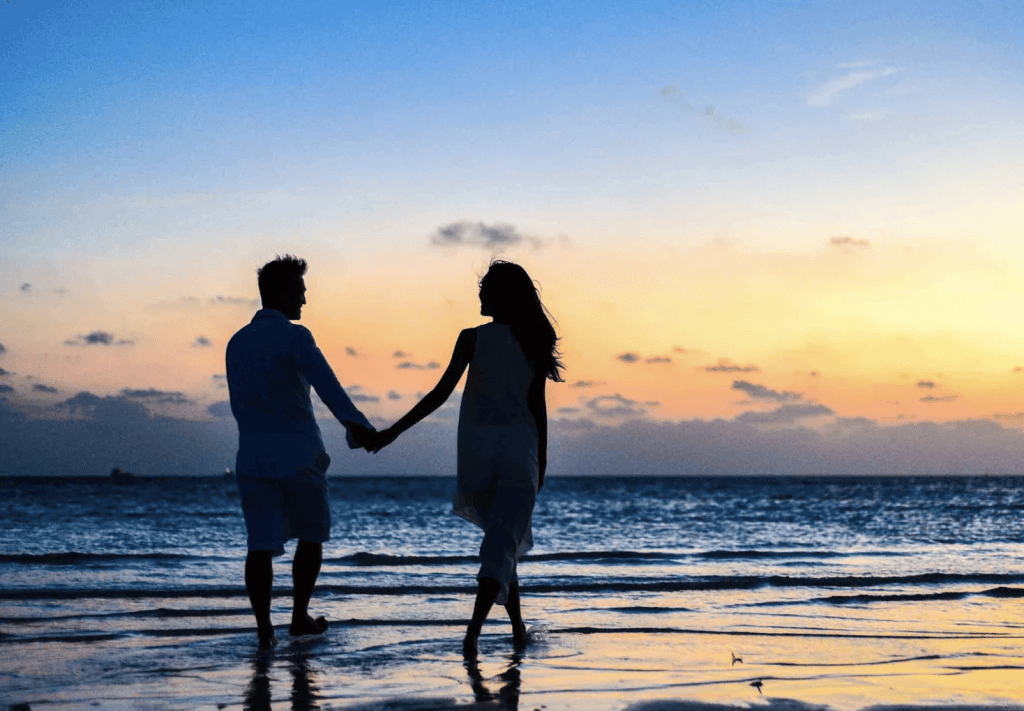 couple walking on the beach